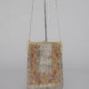 Sac 1930 en micro perles d’acier de couleurs avec un macramé de franges