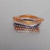 5 bracelets en plastique incrustés de strass blancs