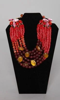 Gros collier en perles de verre orange et bordeaux