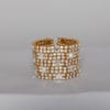 Bracelet manchette en métal doré et strass