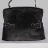 Sac 1950 en fourrure noire et pattes en cuir