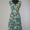 Robe 1950 imprimé multicolore sur fond bleu vert