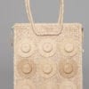 Sac en paille tissé avec petits chapeaux de paille en décor