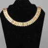 Collier en métal doré articulé Pierre Cardin
