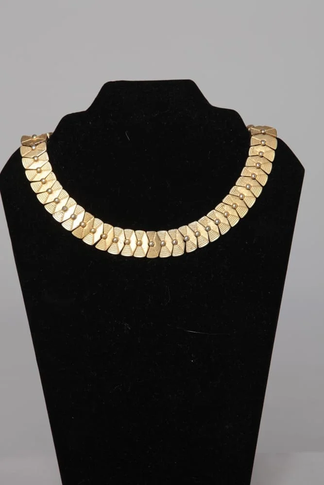 Collier en métal doré articulé Pierre Cardin