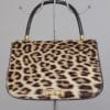 Sac en cuir et léopard 1950