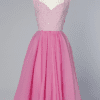 Robe Barbie 1950 - 1960 en nylon rose et lamé argent