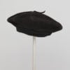 Béret en daim noir 1960