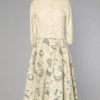 Jupe 1950 en laine bouillie écrue à motifs bleus et or