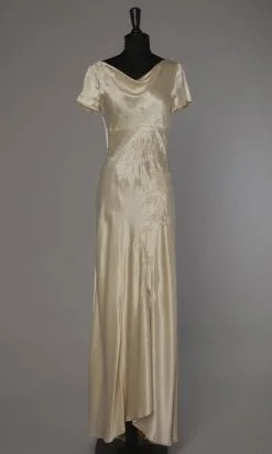 Robe de mariée 1990 en satin champagne griffée Lolita Lempicka