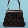Sac 1950 en cuir et soie noire et velours marron au sabre