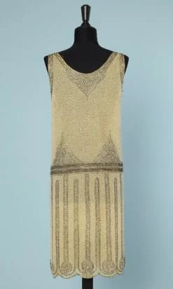 Robe 1925 en mousseline jaune brodée de perles et paillettes