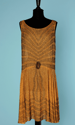 Robe en voile de coton jaune perlée noir et jaune