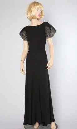 Longue robe 1930 en crêpe noir et strass