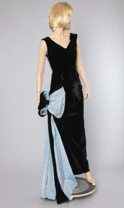 n2404_robe_en_velours_noir_et_gros_noeud_bleu_a_pois_or_et_noir_taille38_pic001