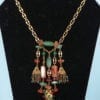 Collier chaînes pierres et pâte de verre griffé Nina Ricci
