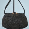 Sac du soir 1940 en daim et satin noir matelassé