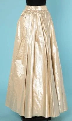 Jupe longue en faille de soie or plissée