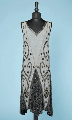 Robe 1925 en voile de coton gris brodé de perles noires or et argent