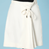 Mini jupe blanche griffée Claude Montana