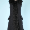 Manteau en laine noire et franges en Mongolie griffé Valentino