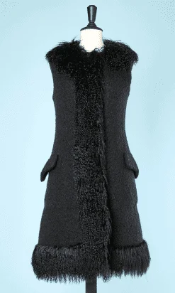 Manteau en laine noire et franges en Mongolie griffé Valentino
