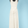 Robe longue en tricot écru brodée de perles et strass