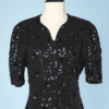 Veste 1940 en crêpe noir brodée de paillettes