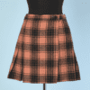 Mini jupe 1960-70 en lainage écossais rose et noir