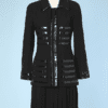 Tailleur vintage Chanel en lainage noir et cuir verni