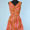 Robe 1960 en mousseline imprimée de fleurs oranges et roses