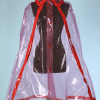 Cape de pluie 1960-1970 en plastique rose transparent