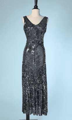 Robe longue 1930 en tulle noir brodé de paillettes irisées