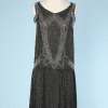 Robe 1925 en voile de coton noir perlé blanc et transparent