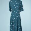 na5878-Robe-1940-en-rayonne-turquoise-imprimé-de-motifs-noirs-et-blancs-t38-01