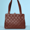 A357-Sac-Chanel-en-cuir-marron-matelassé