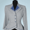 na9005-Veste-en-lainage-gris-moucheté-bleu-et-liserés-bleus-Lilli-Annette-t38-40-01