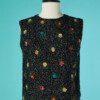 B7357-Pull-sans-manches-en-laine-noire-rode-de-paillettes-noires-et-couleurs-t40-001