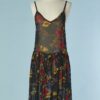 C0167-Mini-robeJean-Paul-Gaultier-en-voile-noir-imprime-de-fleurs-rouges-jaunes-violettes-t40-01