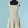 C1804-Robe-Alaia-en-maille-laine-et-polyamide-blanc-et-or-t36-01