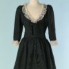 Robe Yves Saint Laurent couture 1960 baby doll soie noire et dentelle blanche